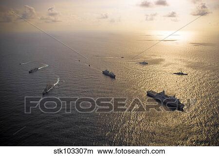 A multi-national naval force navigates the waters of the Caribbean Sea. View Large Photo Image Picture - A multi-national naval force navigates the waters of the Caribbean Sea.. Fotosearch