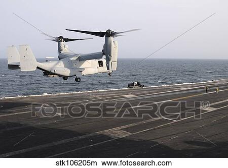 A MV-22 Osprey prepares to land on the flight deck of USS George H. W. Bush. View Large Photo Image Picture - A MV-22 Osprey prepares to land on the flight deck of USS George H. W. Bush.. Fotosearch