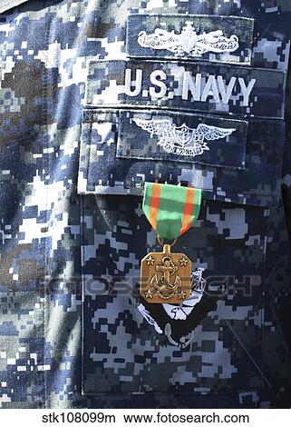 A Navy and Marine Corps Achievement Medal adorns the U. S. Navy uniform. View Large Photo Image Picture - A Navy and Marine Corps Achievement Medal adorns the U. S. Navy uniform.. Fotosearch