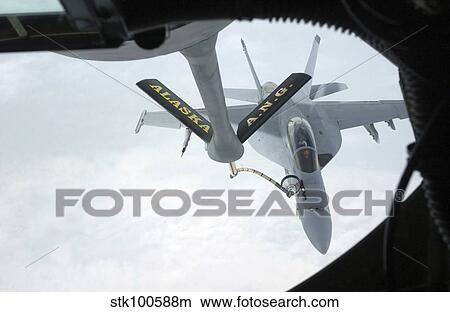 A Navy F/A-18F Super Hornet is refueled by a KC-135R Stratotanker. View Large Photo Image Picture - A Navy F/A-18F Super Hornet is refueled by a KC-135R Stratotanker.. Fotosearch