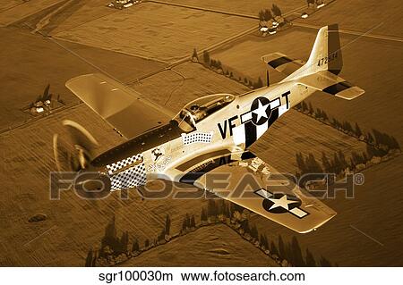 A North American P-51D Mustang in flight. View Large Photo Image Picture - A North American P-51D Mustang in flight.. Fotosearch