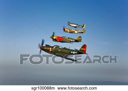 A P-36 Kingcobra, two Curtiss P-40N Warhawks, and a P-51D Mustang in flight. View Large Photo Image Picture - A P-36 Kingcobra, two Curtiss P-40N Warhawks, and a P-51D Mustang in flight.. Fotosearch