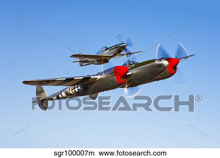 A P-38 Lightning and P-51D Mustang in flight. View Large Photo Image Picture - A P-38 Lightning and P-51D Mustang in flight.. Fotosearch