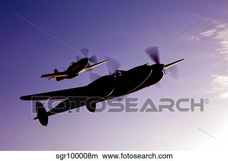 A P-38 Lightning and P-51D Mustang in flight. View Large Photo Image Picture - A P-38 Lightning and P-51D Mustang in flight.. Fotosearch