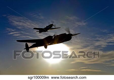 A P-38 Lightning and P-51D Mustang in flight. View Large Photo Image Picture - A P-38 Lightning and P-51D Mustang in flight.. Fotosearch