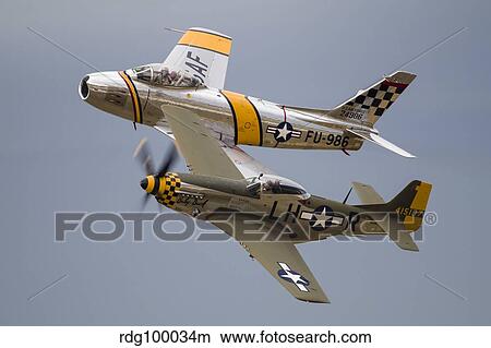 A P-51 Mustang and F-86 Sabre of the Warbird Heritage Foundation. View Large Photo Image Picture - A P-51 Mustang and F-86 Sabre of the Warbird Heritage Foundation.. Fotosearch