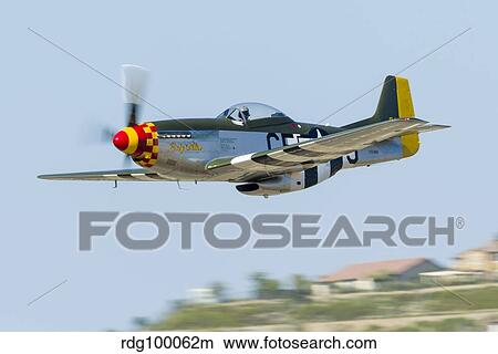 A P-51 Mustang flies by at San Diego, California. View Large Photo Image Picture - A P-51 Mustang flies by at San Diego, California.. Fotosearch