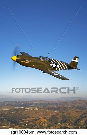 A P-51A Mustang in flight. View Large Photo Image Picture - A P-51A Mustang in flight.. Fotosearch