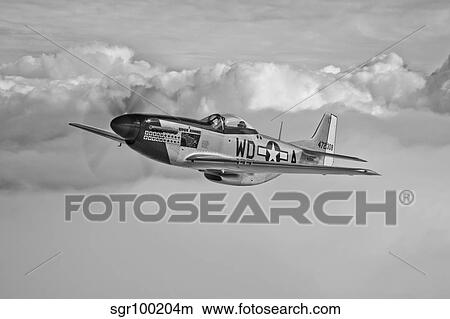 A P-51D Mustang in flight near Hollister, California. View Large Photo Image Picture - A P-51D Mustang in flight near Hollister, California.. Fotosearch