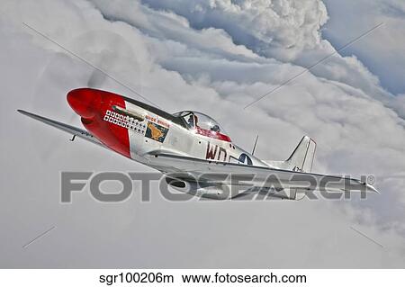 A P-51D Mustang in flight near Hollister, California. View Large Photo Image Picture - A P-51D Mustang in flight near Hollister, California.. Fotosearch