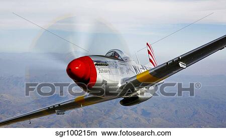 A P-51D Mustang in flight near Prescott, Arizona. View Large Photo Image Picture - A P-51D Mustang in flight near Prescott, Arizona.. Fotosearch