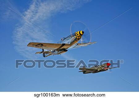 A P-51D Mustang Kimberly Kaye and a P-40E Warhawk in flight. View Large Photo Image Picture - A P-51D Mustang Kimberly Kaye and a P-40E Warhawk in flight.. Fotosearch