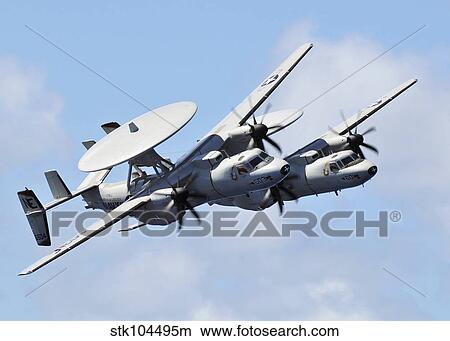 A pair of E-2C Hawkeyes in flight over the Pacific Ocean. View Large Photo Image Picture - A pair of E-2C Hawkeyes in flight over the Pacific Ocean.. Fotosearch