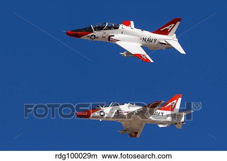 Picture - A pair of T-45 Goshawks of the U. S. Navy break into pattern.. Fotosearch