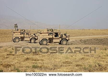 A pair of U. S. Army Cougar MRAP vehicles. View Large Photo Image Picture - A pair of U. S. Army Cougar MRAP vehicles.. Fotosearch