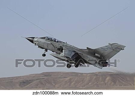 A Panavia Tornado of the Italian Air Force taking off. View Large Photo Image Picture - A Panavia Tornado of the Italian Air Force taking off.. Fotosearch