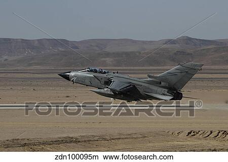 A Panavia Tornado of the Italian Air Force taking off. View Large Photo Image Picture - A Panavia Tornado of the Italian Air Force taking off.. Fotosearch