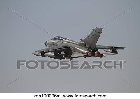 A Panavia Tornado of the Italian Air Force taking off. View Large Photo Image Picture - A Panavia Tornado of the Italian Air Force taking off.. Fotosearch