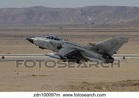 A Panavia Tornado of the Italian Air Force taking off. View Large Photo Image Picture - A Panavia Tornado of the Italian Air Force taking off.. Fotosearch