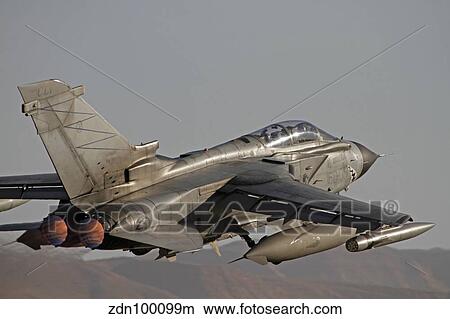 A Panavia Tornado of the Italian Air Force taking off. View Large Photo Image Picture - A Panavia Tornado of the Italian Air Force taking off.. Fotosearch