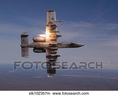 A pilot fires a missile in an A-10 Thunderbolt II. View Large Photo Image Picture - A pilot fires a missile in an A-10 Thunderbolt II.. Fotosearch