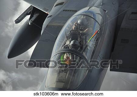 A pilot onboard a U. S. F-15E Strike Eagle takes a photo while getting refueled by a KC-135 Stratotanker. View Large Photo Image Picture - A pilot onboard a U. S. F-15E Strike Eagle takes a photo while getting refueled by a KC-135 Stratotanker.. Fotosearch