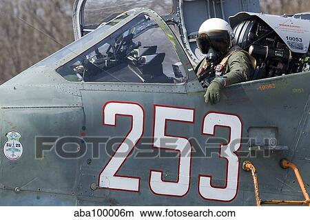 A pilot sitting in the cockpit of a Sukhoi Su-25 aircraft. View Large Photo Image Picture - A pilot sitting in the cockpit of a Sukhoi Su-25 aircraft.. Fotosearch