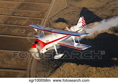 A Pitts Model 12 aircraft in flight. View Large Photo Image Picture - A Pitts Model 12 aircraft in flight.. Fotosearch