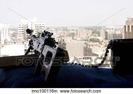 A PK 7. 62mm machine gun nest on top of the Baghdad Hotel during Operation Iraqi Freedom. View Large Photo Image Picture - A PK 7. 62mm machine gun nest on top of the Baghdad Hotel during Operation Iraqi Freedom.. Fotosearch