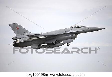 A Polish Air Force F-16C Block 52 in flight over Spain. View Large Photo Image Picture - A Polish Air Force F-16C Block 52 in flight over Spain.. Fotosearch