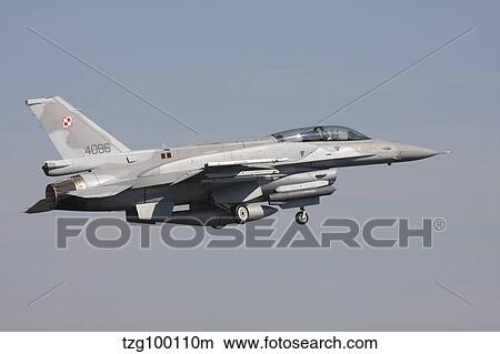 A Polish F-16D Block 52 in flight over Germany. View Large Photo Image Picture - A Polish F-16D Block 52 in flight over Germany.. Fotosearch
