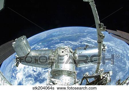 A portion of the International Space Station against Earth's horizon. View Large Photo Image Stock Photograph - A portion of the International Space Station against Earth's horizon.. Fotosearch