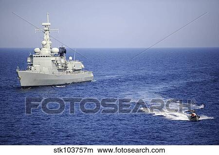 A Portuguese navy team in an inflatable boat leaves Portuguese navy frigat NRP Bartolomeu Dias. View Large Photo Image Picture - A Portuguese navy team in an inflatable boat leaves Portuguese navy frigat NRP Bartolomeu Dias.. Fotosearch