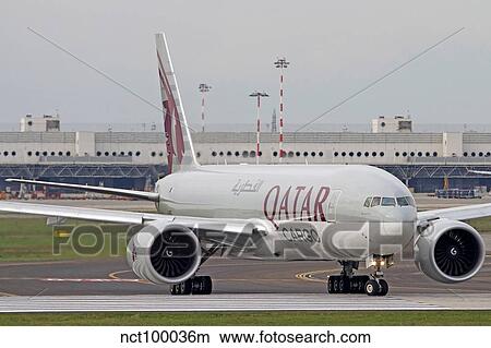 A Qatar Airways Cargo Boeing 777 at Milano Malpensa Airport, Italy. View Large Photo Image Picture - A Qatar Airways Cargo Boeing 777 at Milano Malpensa Airport, Italy.. Fotosearch