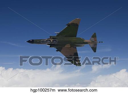 A QF-4E aircraft flies over the Gulf of Mexico. View Large Photo Image Picture - A QF-4E aircraft flies over the Gulf of Mexico.. Fotosearch