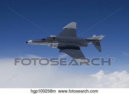 A QF-4E aircraft flies over the Gulf of Mexico. View Large Photo Image Picture - A QF-4E aircraft flies over the Gulf of Mexico.. Fotosearch