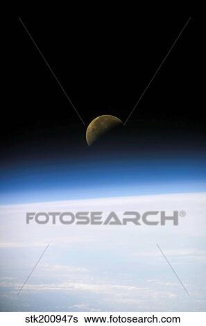 A quarter moon is visible in this oblique view of Earth's horizon and airglow. View Large Photo Image Stock Photograph - A quarter moon is visible in this oblique view of Earth's horizon and airglow.. Fotosearch