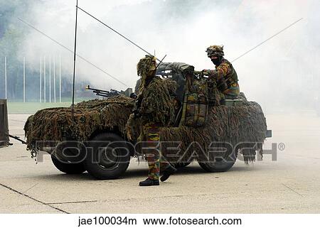 A recce or scout team of the Belgian Army in their VW Iltis jeeps in action. View Large Photo Image Picture - A recce or scout team of the Belgian Army in their VW Iltis jeeps in action.. Fotosearch