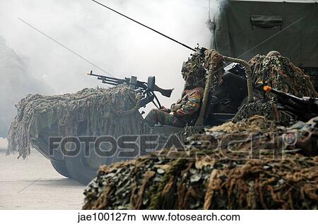 A recce or scout team of the Belgian Army in action. View Large Photo Image Picture - A recce or scout team of the Belgian Army in action.. Fotosearch