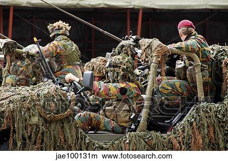 A recce or scout team of the Belgian Army in action. View Large Photo Image Picture - A recce or scout team of the Belgian Army in action.. Fotosearch