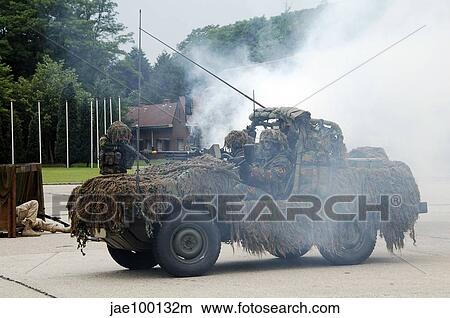 A recce or scout team of the Belgian Army in action. View Large Photo Image Picture - A recce or scout team of the Belgian Army in action.. Fotosearch
