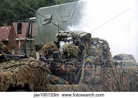 A recce or scout team of the Belgian Army in action. View Large Photo Image Picture - A recce or scout team of the Belgian Army in action.. Fotosearch