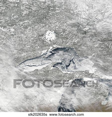 A relatively rare blanket of ice rests on the surface of Lake Superior. View Large Photo Image Stock Photograph - A relatively rare blanket of ice rests on the surface of Lake Superior.. Fotosearch