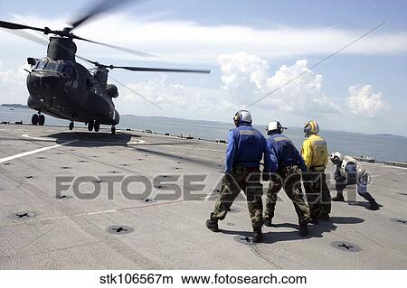 Picture - A Republic of Singapore Air Force CH-47 Chinook lifts off.. Fotosearch