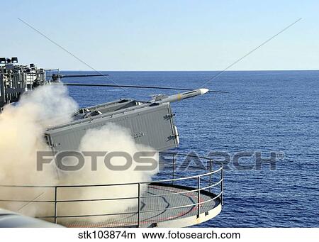 A RIM-7 Sea Sparrow is launched from a Mk-57 aboard aircraft carrier USS Enterprise. View Large Photo Image Picture - A RIM-7 Sea Sparrow is launched from a Mk-57 aboard aircraft carrier USS Enterprise.. Fotosearch