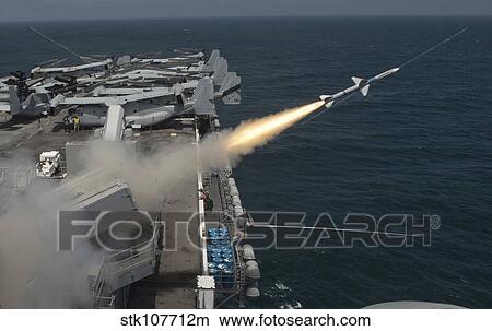 A RIM-7 Sea Sparrow missile is launched from USS Boxer. View Large Photo Image Picture - A RIM-7 Sea Sparrow missile is launched from USS Boxer.. Fotosearch