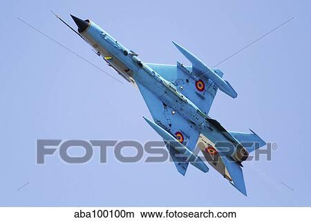 A Romanian Air Force MiG-21 Lancer over Romania. View Large Photo Image Picture - A Romanian Air Force MiG-21 Lancer over Romania.. Fotosearch