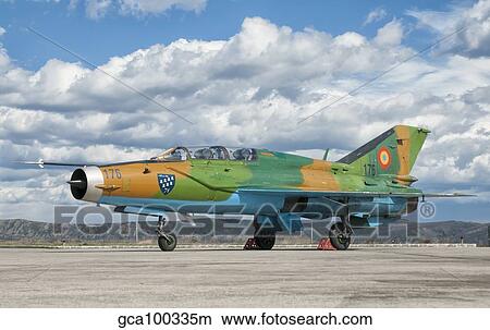 A Romanian Air Force MiG-21B airplane at Camp Turzii Air Base, Romania. View Large Photo Image Picture - A Romanian Air Force MiG-21B airplane at Camp Turzii Air Base, Romania.. Fotosearch
