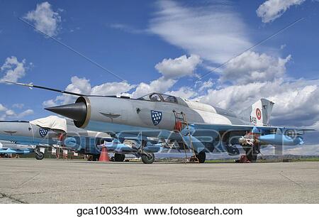 A Romanian Air Force MiG-21C airplane at Camp Turzii Air Base, Romania. View Large Photo Image Picture - A Romanian Air Force MiG-21C airplane at Camp Turzii Air Base, Romania.. Fotosearch