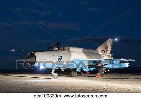 A Romanian Air Force MiG-21C airplane at Camp Turzii Air Base, Romania. View Large Photo Image Picture - A Romanian Air Force MiG-21C airplane at Camp Turzii Air Base, Romania.. Fotosearch
